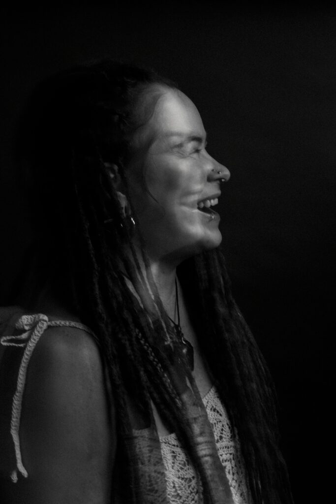 Woman laughing during an authentic women's portrait session